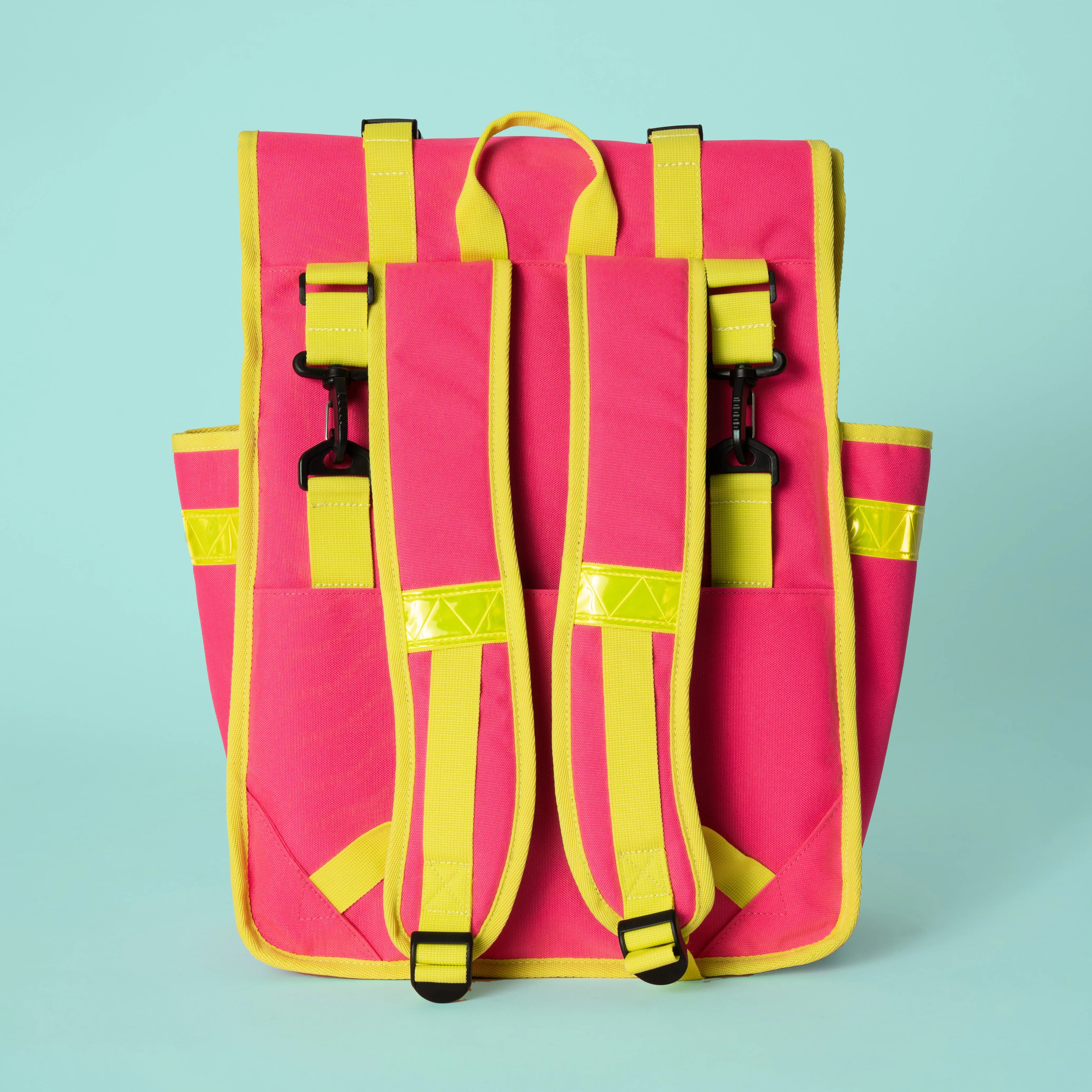 Neon pink rolltop backpack pannier bike bag