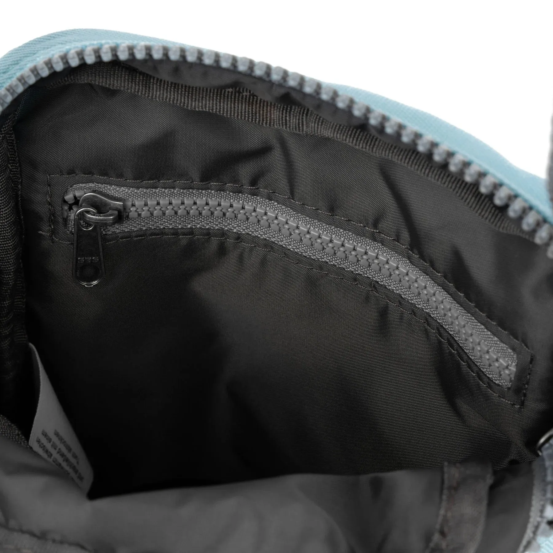 ROKA Bond Small Recycled Canvas Crossbody Pocket Bag | Ice