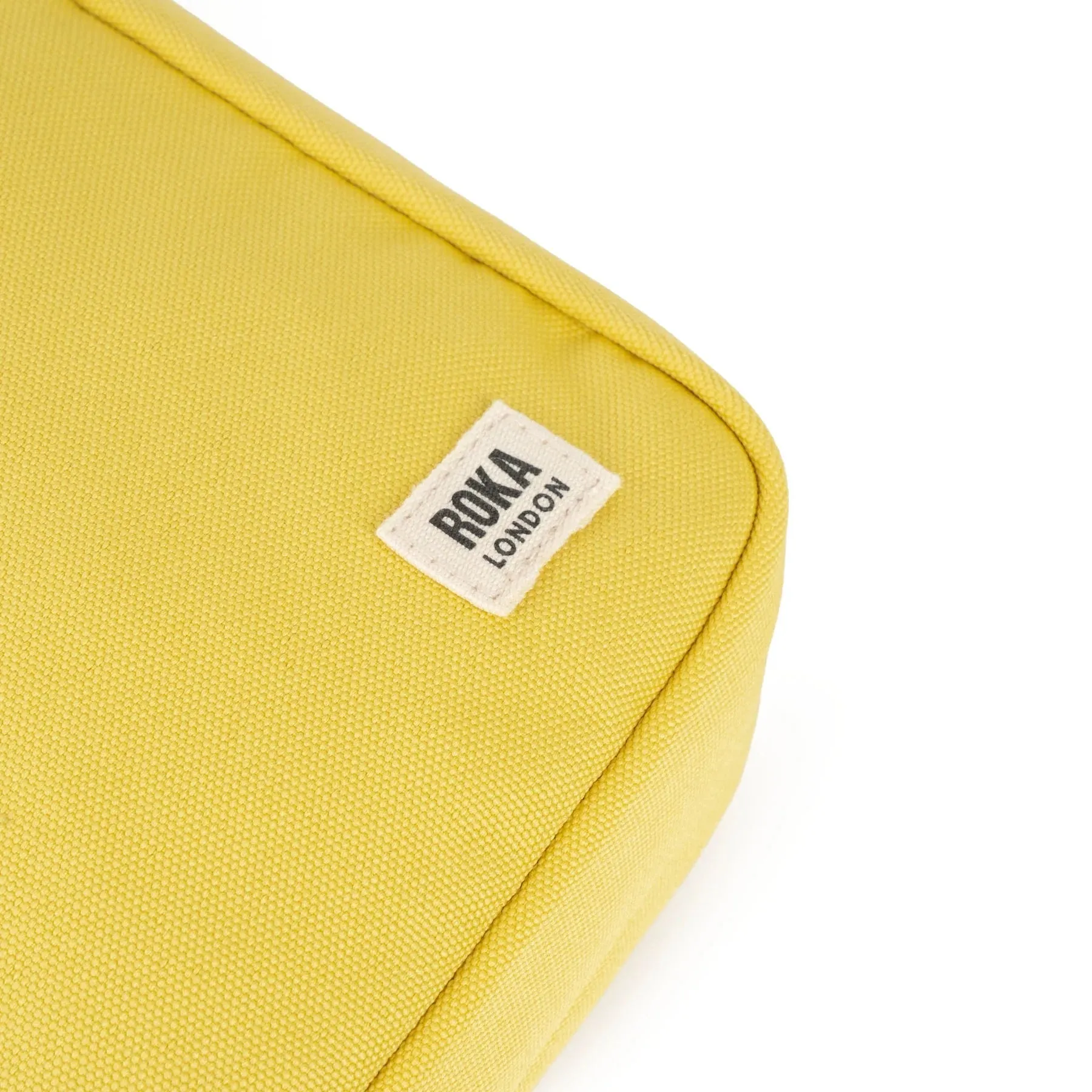 ROKA Bond Small Recycled Canvas Crossbody Pocket Bag | Lemonade